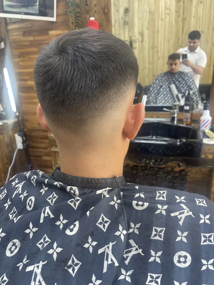 Mid fade with a sharp line at Classic Turkish Barbers